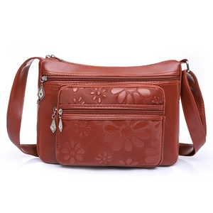 Sac bandoulière en similicuir marron rouge avec motifs tournesols gaufrés et plusieurs poches
