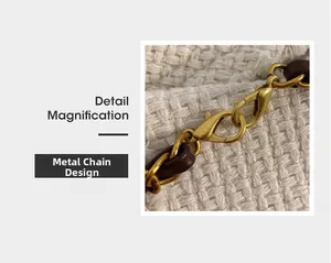 Agrandissement détaillé de la chaîne en métal vintage avec fermoir mousqueton bronze