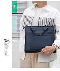 Detail of multi-compartment navy blue waterproof nylon briefcase for business travel