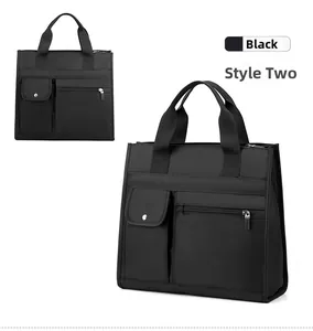 Macro detail of black water-resistant nylon laptop bag with multi-pocket front design
