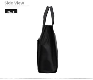Side view of black water-resistant nylon laptop bag showing thick woven handles