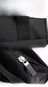 Detailed view of reinforced shoulder strap stitching and branded Suoyate metal zipper