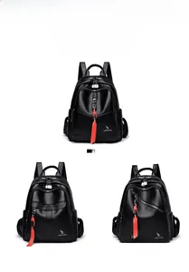 Detailed comparison of black faux leather backpacks with red charms and kangaroo logo