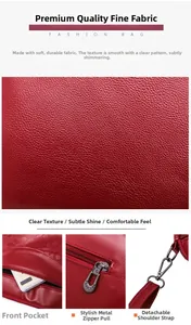 Detail view of lychee texture dark red leather handbag with metal zipper and strap