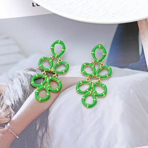 Fashionable layered green leaf drop earrings in gold alloy with enamel finish