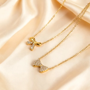 Collier Pendentif Nœud Papillon Zircon Acier Titane Plaqué Or Bijoux Pour Femmes Design Élégant Luxe Minimaliste