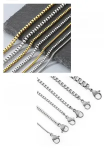 Detail of stainless steel box chains in gold and silver finish with lobster clasp