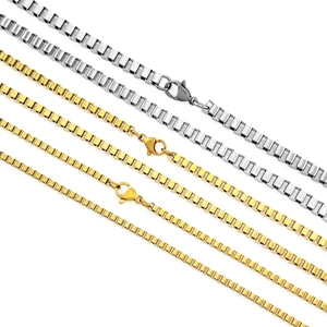 Detail view of gold and silver stainless steel box chains with secure lobster clasps