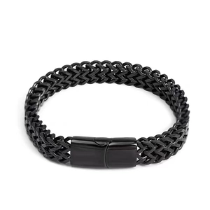 Close-up of men's black stainless steel double-row woven chain bracelet with matte finish