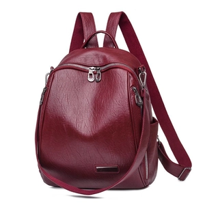Vintage Damen Rucksack aus weinrotem Kunstleder mit verstellbaren Trägern und Metalllogo