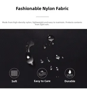 Detail of high-density black nylon fabric showing waterproof surface with water droplets