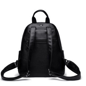 Back view of black leather backpack with adjustable straps and multi-pocket design