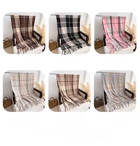 Selection of six colors of classic plaid scarves with fringe in a 2x3 grid display