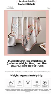 Dettaglio di sciarpa in seta con magnolia e uccelli in stile inchiostro con texture satin