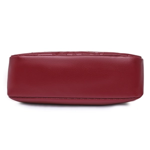 Classic deep red embossed leather crossbody bag for women showing durable bottom stitching
