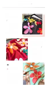 Détail des foulards en soie imprimée florale avec des finitions de bordure délicates