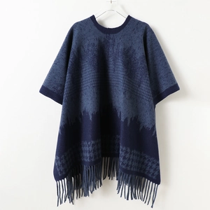 Dark blue houndstooth knit poncho shawl with fringe hem for autumn and winter