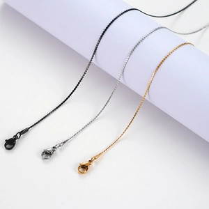 Flat S-chain stainless steel necklaces in black, silver, and gold with lobster clasps