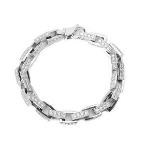 Macro shot of 316L stainless steel Cuban link bracelet with micro-paved zircon crystals