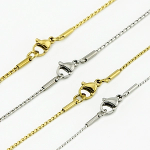 Detail of 304 stainless steel snake chain necklaces in gold and silver with lobster clasp