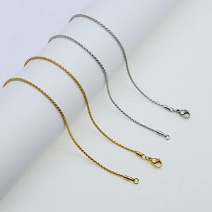 Detail of 304 stainless steel snake chains in gold and silver with lobster clasp