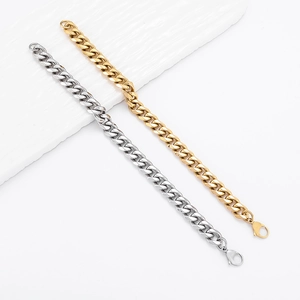Polished silver and gold stainless steel Cuban link bracelets with lobster clasps
