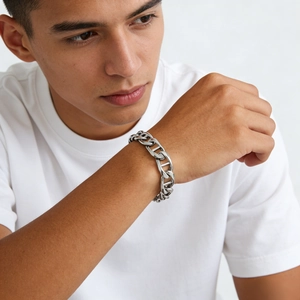Polished silver stainless steel Cuban link bracelet for men in minimalist industrial style