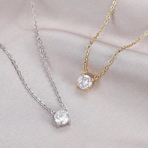 Collier en acier inoxydable avec pendentif en zircon 7mm en fini or et argent