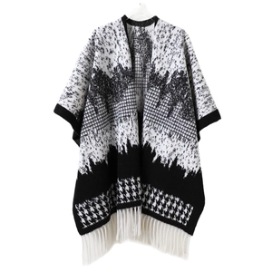 Black and white houndstooth shawl with knit fringe and geometric pattern for autumn
