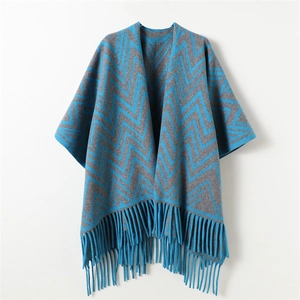 Blue and gray zigzag cashmere-like poncho with tassel trim and open front design