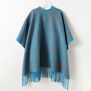 Blue and gray zigzag pattern cashmere-like knitted poncho with elegant long fringes