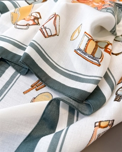 Detailed view of the herringbone silk texture and vintage fashion accessory patterns