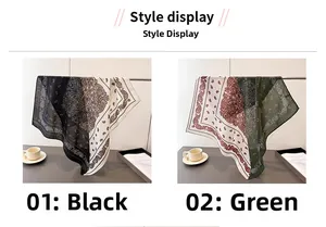 Detail view of paisley pattern cotton scarves in black and green with bohemian style