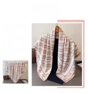Macro detail of the elegant striped satin scarf with premium smooth glossy texture