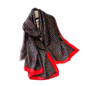 Silk-like geometric long scarf with red border and colorful abstract patterns on black base