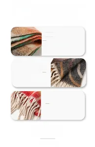 Detailed macro view of wool rich rainbow plaid scarf texture and fringe tassel finish