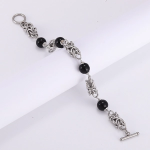 Titanium steel bracelet with obsidian beads, cross charm, and classic toggle clasp