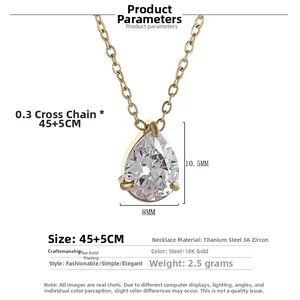 Macro detail of gold plated teardrop necklace featuring a 3A cubic zirconia stone inlay