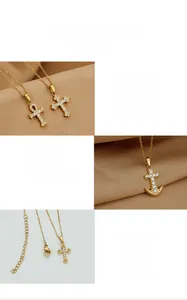 Macro shot of gold cross pendants featuring cubic zirconia inlays on titanium steel chains