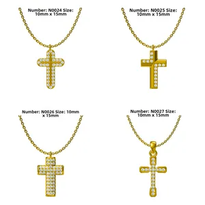 Detailed size chart showing four gold cross pendants with cubic zirconia measurements