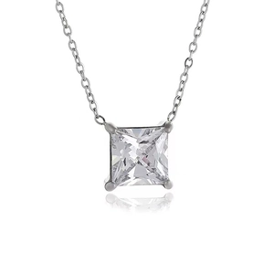 Macro detail of square zircon pendant with four-prong setting on silver chain necklace