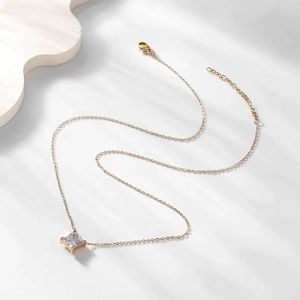 Detail of 18K gold-plated necklace with a square cubic zirconia pendant in 4-prong setting