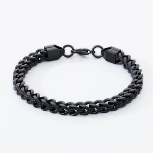 Close-up of black stainless steel wheat chain bracelet with secure lobster clasp