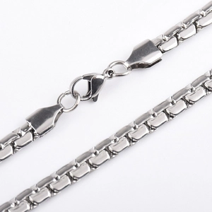 Detail of a silver stainless steel square link chain with a sturdy lobster clasp