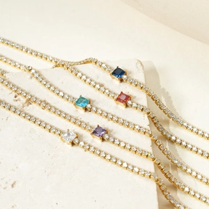 Gold tennis bracelets with sparkling white cubic zirconia and square colored gemstones