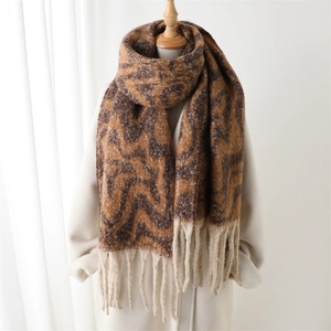 Geometric cashmere-feel shawl with brown and beige waves and fringe details