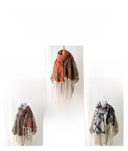 Detail view of plaid cashmere scarf textures with thick tassel edges and colorful patterns
