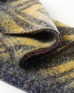 Macro shot of colorful zigzag pattern knit scarf fabric with soft brushed cashmere texture