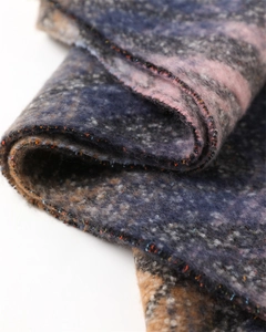 Macro view of thick colorful zigzag striped scarf with soft cashmere-like texture details