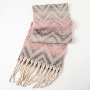 Detail of pink and grey zigzag pattern cashmere-feel scarf with long tassels